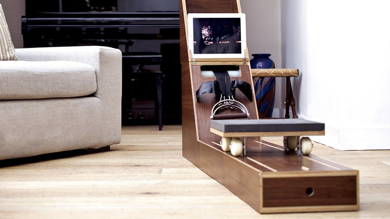Illustration for article titled Watch This Tiny Side Table Transform Into a Full-On Rowing Machine